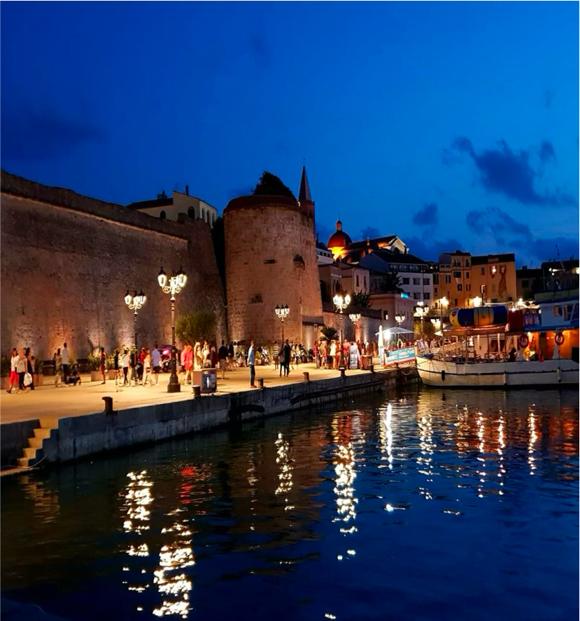 Alghero by night from Castelsardo hotel